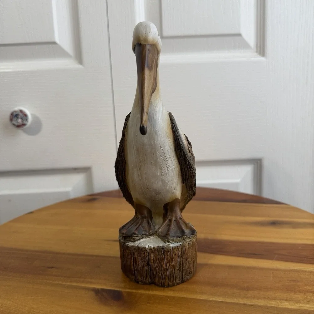 Tii Collections Resin Carved Pelican On Log Nautical Coastal Beach Figurine
